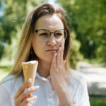 Woman with Ice Cream Toothache