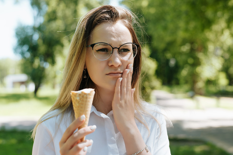 Woman with Ice Cream Toothache